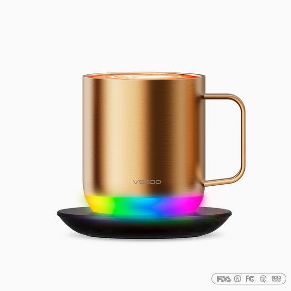 Vsitoo gold S6 plus warming coffee mugs place on the charging coaster