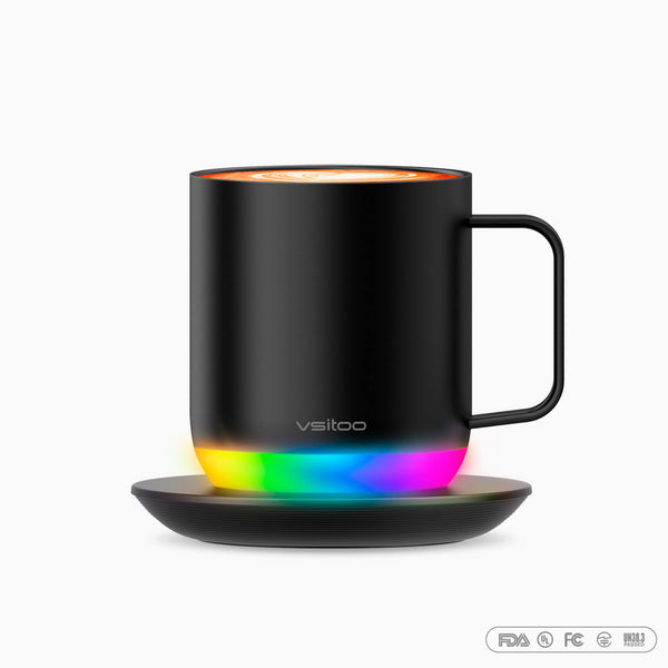 Vsitoo black S6 plus warming coffee mugs place on the charging coaste.